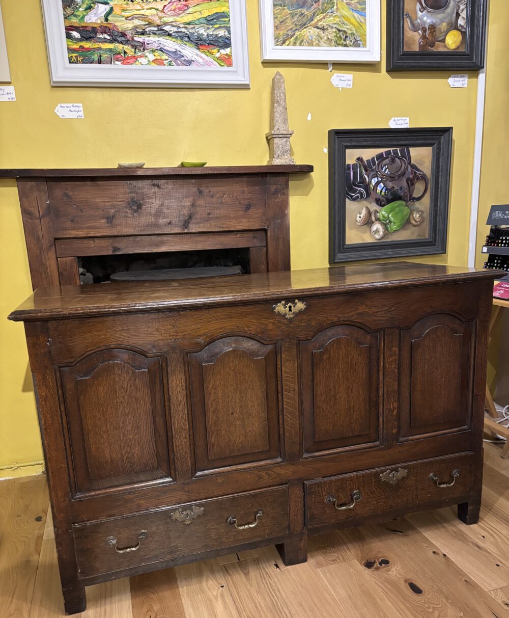 Image of a mule chest from the Georgian period about to be introduced to our art & music venue