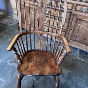 old fashioned high back wooden arm chair