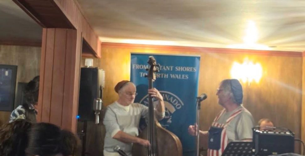 snapshot of the basement bar with musicians playing